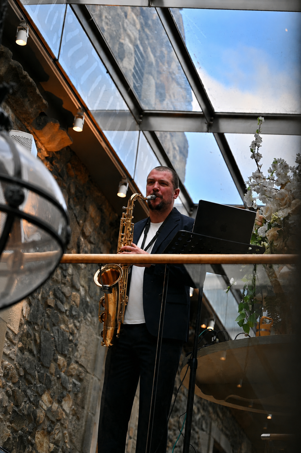 Josh portrait with saxophone